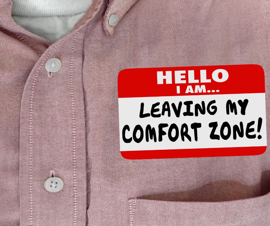 faceless person wearing a mauve button-down shirt with a name tag that reads "Hello, I'm leaving my comfort zone" for the blog post "how to get out of your comfort zone comfortably."